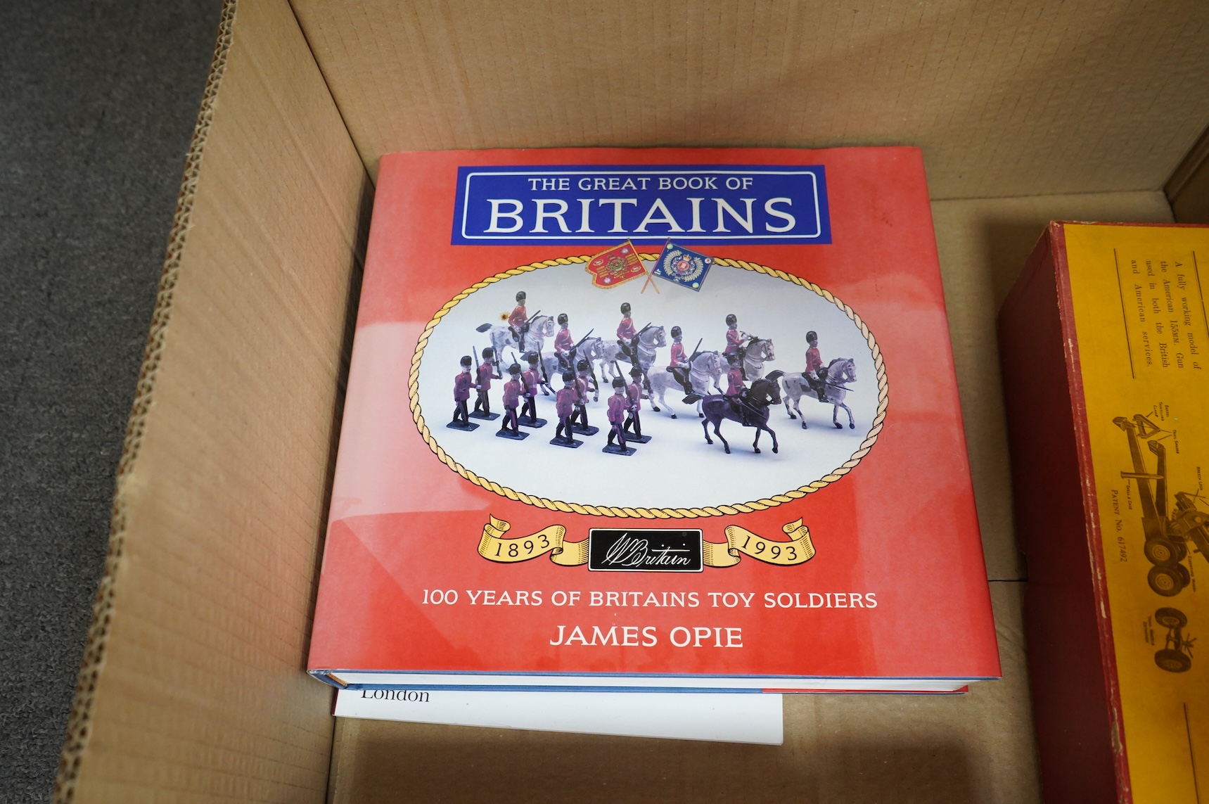 A collection of Britains military soldiers, etc, including two boxed Britains military field guns; an 18” Howitzer (No.2107), and a 155mm Gun (No.2064), both with some accessories and shells missing, an unboxed Bren Gun